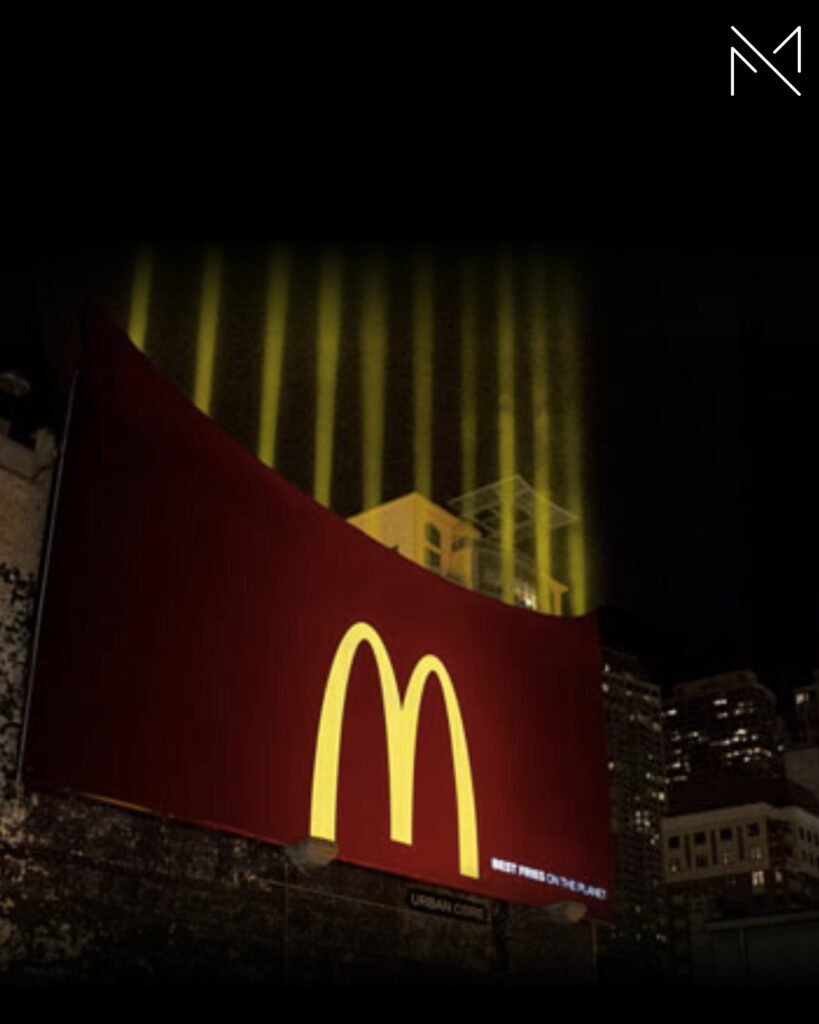 A campaign for McDonalds where the yellow flood lights looks like McDonalds Fries in the night sky
